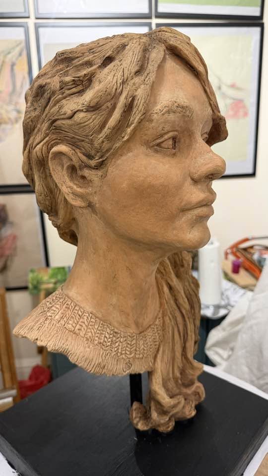 Terracotta portrait bust by Carole Smith, profile view